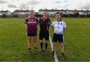 11 March 2022; Referee Maggie Farrelly with team captains Niamh Daly of NUIG and Katie Quirke of UCC during the Yoplait LGFA O'Connor Cup Semi-Final match between UL, Limerick and NUIG, Galway at DCU Dóchas Éireann Astro Pitch in Dublin. Photo by Eóin Noonan/Sportsfile