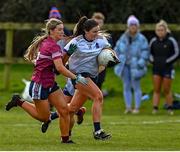 11 March 2022; Erone Fitzpatrick of UL in action against Lauren McGregor of NUIG during the Yoplait LGFA O'Connor Cup Semi-Final match between UL, Limerick and NUIG, Galway at DCU Dóchas Éireann Astro Pitch in Dublin. Photo by Eóin Noonan/Sportsfile