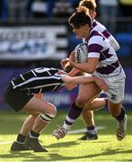 11 March 2022; Tomas Strickland of Clongowes Wood College is tackled by Jack Deegan of Cistercian College Roscrea during the Bank of Ireland Leinster Schools Junior Cup 2nd Round match between Clongowes Wood College and Cistercian College Roscrea at Energia Park in Dublin. Photo by Harry Murphy/Sportsfile