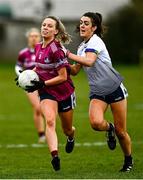 11 March 2022; Hannah Noone of NUIG in action against Erika O'Shea of UL during the Yoplait LGFA O'Connor Cup Semi-Final match between UL, Limerick and NUIG, Galway at DCU Dóchas Éireann Astro Pitch in Dublin. Photo by Eóin Noonan/Sportsfile