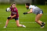 11 March 2022; Eva Noone of NUIG in action against Sarah Cunney of UL during the Yoplait LGFA O'Connor Cup Semi-Final match between UL, Limerick and NUIG, Galway at DCU Dóchas Éireann Astro Pitch in Dublin. Photo by Eóin Noonan/Sportsfile