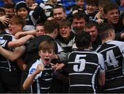 11 March 2022; Ronan Sullivan of Cistercian College Roscrea and teammates celebrate with supporters after their side's victory in the Bank of Ireland Leinster Schools Junior Cup 2nd Round match between Clongowes Wood College and Cistercian College Roscrea at Energia Park in Dublin. Photo by Harry Murphy/Sportsfile