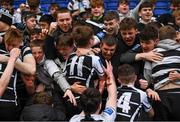 11 March 2022; Cistercian College Roscrea players and supporters celebrate after their side's victory in the Bank of Ireland Leinster Schools Junior Cup 2nd Round match between Clongowes Wood College and Cistercian College Roscrea at Energia Park in Dublin. Photo by Harry Murphy/Sportsfile