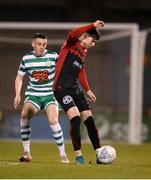 11 March 2022; Stephen Mallon of Bohemians in action against Gary O'Neill of Shamrock Rovers during the SSE Airtricity League Premier Division match between Shamrock Rovers and Bohemians at Tallaght Stadium in Dublin. Photo by Stephen McCarthy/Sportsfile