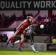 11 March 2022; Patrick Hoban of Dundalk has a header on target despite the efforts of Aaron O’Driscoll of Shelbourne during the SSE Airtricity League Premier Division match between Shelbourne and Dundalk at Tolka Park in Dublin. Photo by Eóin Noonan/Sportsfile