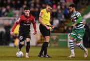 11 March 2022; Ali Coote of Bohemians in action against Barry Cotter of Shamrock Rovers, watched by referee Robert Hennessy, during the SSE Airtricity League Premier Division match between Shamrock Rovers and Bohemians at Tallaght Stadium in Dublin. Photo by Seb Daly/Sportsfile