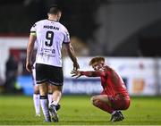 11 March 2022; Aodh Dervin of Shelbourne with Patrick Hoban of Dundalk after the SSE Airtricity League Premier Division match between Shelbourne and Dundalk at Tolka Park in Dublin. Photo by Eóin Noonan/Sportsfile