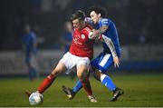 11 March 2022; Chris Forrester of St Patrick's Athletic in action against Barry McNamee of Finn Harps during the SSE Airtricity League Premier Division match between Finn Harps and St Patrick's Athletic at Finn Park in Ballybofey, Donegal. Photo by Ramsey Cardy/Sportsfile