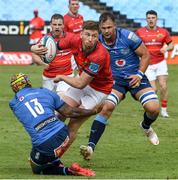 12 March 2022; Ben Healy of Munster is tackled by Lionel Mapoe of Vodacom Bulls during the United Rugby Championship match between Vodacom Bulls and Munster at Loftus Versfeld in Pretoria, South Africa. Photo by Lee Warren/Sportsfile