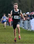 12 March 2022; Scott Fagan of Castleknock CC, Dublin, celebrates winning the senior boys 6500m during the Irish Life Health All-Ireland Schools Cross Country at the City of Belfast Mallusk Playing Fields in Belfast. Photo by Ramsey Cardy/Sportsfile