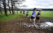 12 March 2022; Dean Casey of St Flannans Ennis, Clare, left, and Scott Fagan of Castleknock CC, Dublin, competing in the senior boys 6500m competing in the senior boys 6500m during the Irish Life Health All-Ireland Schools Cross Country at the City of Belfast Mallusk Playing Fields in Belfast. Photo by Ramsey Cardy/Sportsfile