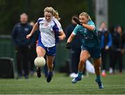 12 March 2022; Eimear Kiely of Mary Immaculate College in action against Anna O'Donovan of TU Dublin during the Yoplait LGFA Giles Cup Final match between TU Dublin and Mary Immaculate College at DCU in Dublin. Photo by Eóin Noonan/Sportsfile