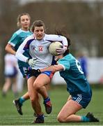 *** CAPTION CORRECTION *** 12 March 2022; Roisin Howard of Mary Immaculate College is tackled by Kacey Geoghegan of TU Dublin during the Yoplait LGFA Giles Cup Final match between TU Dublin and Mary Immaculate College at DCU in Dublin. Photo by Eóin Noonan/Sportsfile