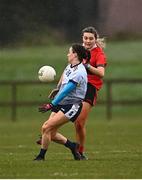 12 March 2022; Eve Mullins of UCC in action against Dearbhaile Beirne of UL during the Yoplait LGFA O'Connor Cup Final match between UCC and UL at DCU in Dublin. Photo by Eóin Noonan/Sportsfile