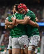 12 March 2022; James Lowe of Ireland celebrates with teammates Josh van der Flier, right, and Jamison Gibson Park after scoring their side's first try during the Guinness Six Nations Rugby Championship match between England and Ireland at Twickenham Stadium in London, England. Photo by David Fitzgerald/Sportsfile