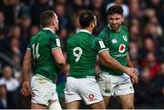 12 March 2022; Hugo Keenan of Ireland, right, celebrates with Jamison Gibson Park, 9, and Andrew Conway after scoring their side's second try during the Guinness Six Nations Rugby Championship match between England and Ireland at Twickenham Stadium in London, England. Photo by David Fitzgerald/Sportsfile