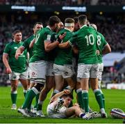 12 March 2022; Ireland players celebrate their side's second try, scored by Hugo Keenan, hidden, during the Guinness Six Nations Rugby Championship match between England and Ireland at Twickenham Stadium in London, England. Photo by Brendan Moran/Sportsfile