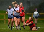 12 March 2022; Ailish Morrissey of UL in action against Katie Horgan of UCC during the Yoplait LGFA O'Connor Cup Final match between UCC and UL at DCU in Dublin. Photo by Eóin Noonan/Sportsfile