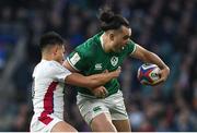 12 March 2022; James Lowe of Ireland is tackled by Marcus Smith of England during the Guinness Six Nations Rugby Championship match between England and Ireland at Twickenham Stadium in London, England. Photo by Brendan Moran/Sportsfile