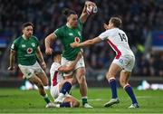 12 March 2022; James Lowe of Ireland is tackled by Marcus Smith and Max Malins of England during the Guinness Six Nations Rugby Championship match between England and Ireland at Twickenham Stadium in London, England. Photo by Brendan Moran/Sportsfile
