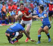 12 March 2022; Chris Farrell of Munster is tackled by Madosh Tambwe, left, and Harold Vorster of Vodacom Bulls during the United Rugby Championship match between Vodacom Bulls and Munster at Loftus Versfeld in Pretoria, South Africa. Photo by Lee Warren/Sportsfile