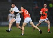 12 March 2022; Shea Ryan of Kildare is tackled by James Morgan of Armagh during the Allianz Football League Division 1 match between Armagh and Kildare at the Athletic Grounds in Armagh. Photo by Piaras Ó Mídheach/Sportsfile