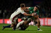 12 March 2022; James Lowe of Ireland is tackled by Max Malins and Courtney Lawes of England during the Guinness Six Nations Rugby Championship match between England and Ireland at Twickenham Stadium in London, England. Photo by Brendan Moran/Sportsfile