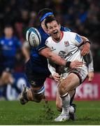 12 March 2022; Billy Burns of Ulster is tackled by Joe McCarthy of Leinster during the United Rugby Championship match between Ulster and Leinster at Kingspan Stadium in Belfast. Photo by Harry Murphy/Sportsfile