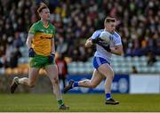 13 March 2022; Mícheal Bannigan of Monaghan in action against Jason McGee of Donegal during the Allianz Football League Division 1 match between Donegal and Monaghan at MacCumhaill Park in Ballybofey, Donegal. Photo by Ramsey Cardy/Sportsfile