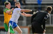 13 March 2022; Kieran Hughes of Monaghan is tackled by Ciaran Thompson of Donegal during the Allianz Football League Division 1 match between Donegal and Monaghan at MacCumhaill Park in Ballybofey, Donegal. Photo by Ramsey Cardy/Sportsfile