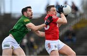 13 March 2022; Brian Hurley of Cork is tackled by Donal Keogan of Meath during the Allianz Football League Division 2 match between Meath and Cork at Páirc Táilteann in Navan, Meath. Photo by Brendan Moran/Sportsfile