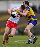 13 March 2022; Ethan Doherty of Derry in action against David Murray of Roscommon during the Allianz Football League Division 2 match between Roscommon and Derry at Dr Hyde Park in Roscommon. Photo by Piaras Ó Mídheach/Sportsfile