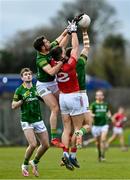 13 March 2022; Donal Keogan, left, and Ronan Jones of Meath contest a kickout with Colm O’Callaghan of Cork during the Allianz Football League Division 2 match between Meath and Cork at Páirc Táilteann in Navan, Meath. Photo by Brendan Moran/Sportsfile