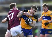 13 March 2022; Ciaran Russell of Clare in action against Jack Glynn of Galway during the Allianz Football League Division 2 match between Galway and Clare at Tuam Stadium in Tuam, Galway. Photo by Ray Ryan/Sportsfile