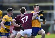 hug 13 March 2022; Ciaran Russell of Clare, right, in action against Jack Glynn of Galway, 17, during the Allianz Football League Division 2 match between Galway and Clare at Tuam Stadium in Tuam, Galway. Photo by Ray Ryan/Sportsfile