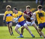 13 March 2022; David Tubridy of Clare  in action against Robert Finnerty of Galway during the Allianz Football League Division 2 match between Galway and Clare at Tuam Stadium in Tuam, Galway. Photo by Ray Ryan/Sportsfile