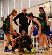 13 March 2022; A'Lexxus Davis of Trinity Meteors with teammates after sustaining an injury during the MissQuote.ie SuperLeague match between The Address UCC Glanmire and Trinity Meteors at Mardyke Arena in Cork. Photo by Eóin Noonan/Sportsfile