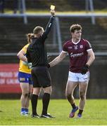 13 March 2022; Owen Gallagher of Galway receives a yellow card from referee Conor Lane during the Allianz Football League Division 2 match between Galway and Clare at Tuam Stadium in Tuam, Galway. Photo by Ray Ryan/Sportsfile