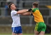 13 March 2022; Conor McCarthy of Monaghan and Stephen McMenamin of Donegal tussle during the Allianz Football League Division 1 match between Donegal and Monaghan at MacCumhaill Park in Ballybofey, Donegal. Photo by Ramsey Cardy/Sportsfile