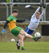 13 March 2022; Ryan McAnespie of Monaghan charges down Jamie Brennan of Donegal during the Allianz Football League Division 1 match between Donegal and Monaghan at MacCumhaill Park in Ballybofey, Donegal. Photo by Ramsey Cardy/Sportsfile