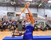 13 March 2022; Aine McKenna of The Address UCC Glanmire lifting the trophy after the MissQuote.ie SuperLeague match between The Address UCC Glanmire and Trinity Meteors at Mardyke Arena in Cork. Photo by Eóin Noonan/Sportsfile
