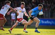 13 March 2022; Seán Bugler of Dublin in action against Michael McKernan, 2, and Johnny Munroe of Tyrone during the Allianz Football League Division 1 match between Tyrone and Dublin at O'Neill's Healy Park in Omagh, Tyrone. Photo by Ray McManus/Sportsfile