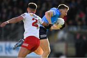 13 March 2022; Seán Bugler of Dublin is tackled by Michael McKernan of Tyrone during the Allianz Football League Division 1 match between Tyrone and Dublin at O'Neill's Healy Park in Omagh, Tyrone. Photo by Ray McManus/Sportsfile