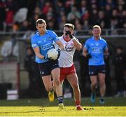 13 March 2022; Dean Rock of Dublin goes past Michael McKernan of Tyrone on his way to scoring his side's 9th point during the Allianz Football League Division 1 match between Tyrone and Dublin at O'Neill's Healy Park in Omagh, Tyrone. Photo by Ray McManus/Sportsfile