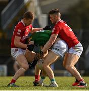 13 March 2022; Shane Walsh of Meath is tackled by Joe Grimes, left, and Kevin Flahive of Cork during the Allianz Football League Division 2 match between Meath and Cork at Páirc Táilteann in Navan, Meath. Photo by Brendan Moran/Sportsfile