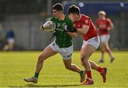 13 March 2022; Jason Scully of Meath is tackled by Tadhg Corkery of Cork during the Allianz Football League Division 2 match between Meath and Cork at Páirc Táilteann in Navan, Meath. Photo by Brendan Moran/Sportsfile