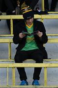 13 March 2022; A Meath supporter reads the match programme before the Allianz Football League Division 2 match between Meath and Cork at Páirc Táilteann in Navan, Meath. Photo by Brendan Moran/Sportsfile