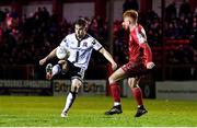11 March 2022; Dan Williams of Dundalk in action against Aodh Dervin of Shelbourne during the SSE Airtricity League Premier Division match between Shelbourne and Dundalk at Tolka Park in Dublin. Photo by Eóin Noonan/Sportsfile
