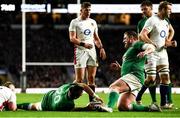 12 March 2022; Tadhg Furlong slides in to celebrate with team mate Jack Conan of Ireland after he scored their side's third try during the Guinness Six Nations Rugby Championship match between England and Ireland at Twickenham Stadium in London, England. Photo by David Fitzgerald/Sportsfile