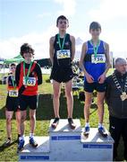 12 March 2022; Ferdia Mcdonagh of Lucan CC, Dublin, Noah Watt of Campbell College, Belfast, and Kevin Finn of Nenagh CBS, Tipperary, after competing in the minor boys 2500m during the Irish Life Health All-Ireland Schools Cross Country at the City of Belfast Mallusk Playing Fields in Belfast. Photo by Ramsey Cardy/Sportsfile